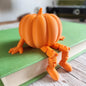 Cute Pumpkin Figurine with Dangling Legs – Fall Desk Décor, Halloween Shelf Sitter Ornament